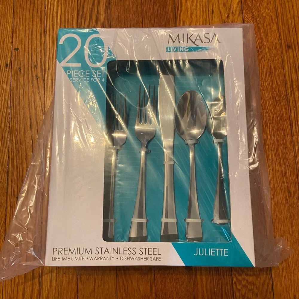 Mikasa Living new 20 piece premium stainless steel cutlery. Never opened.